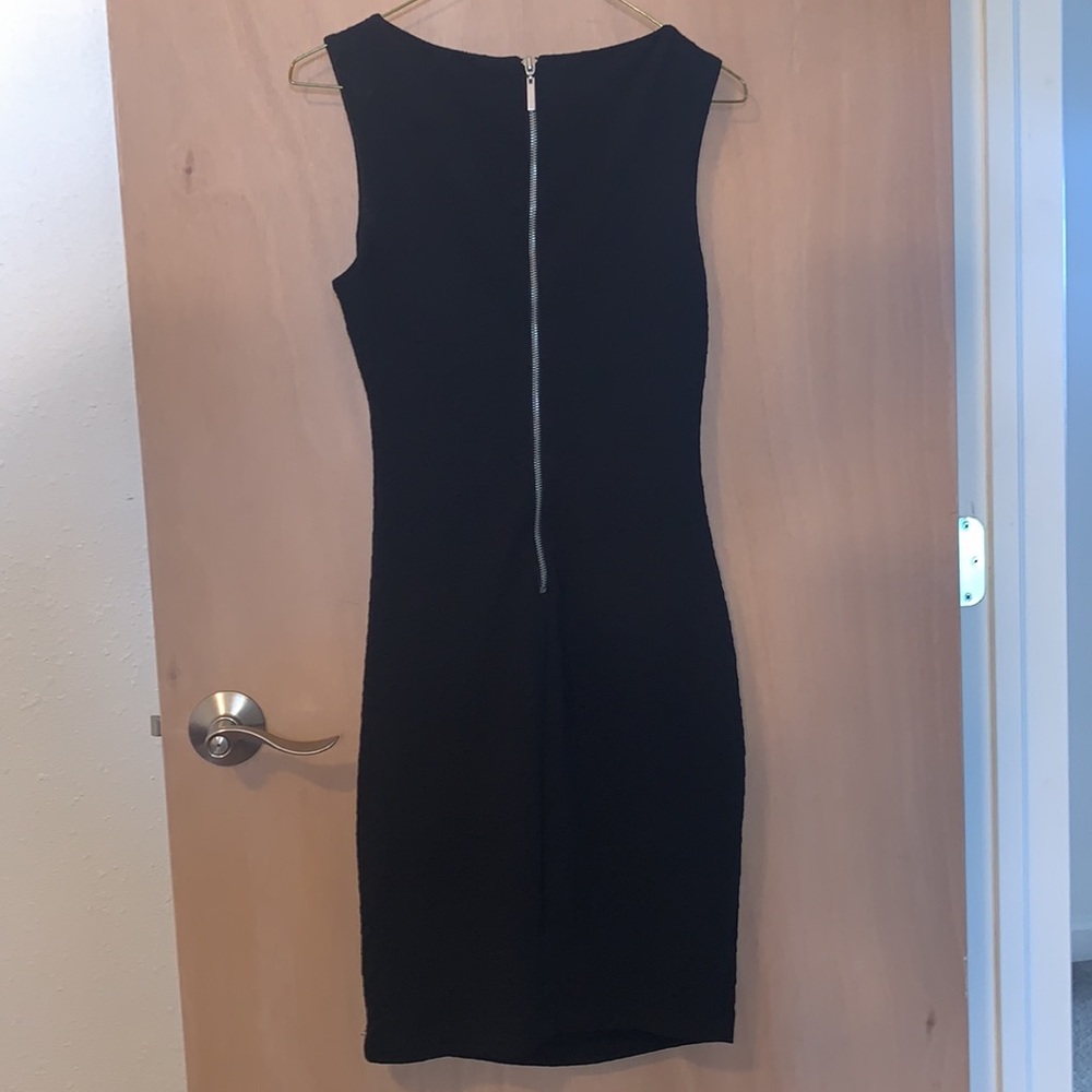 Black bodycon mid length dress, houndstooth print, rouching, double lined